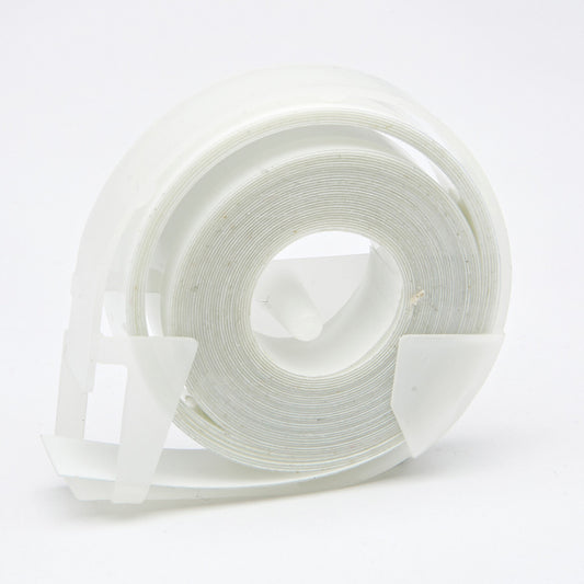 A roll of white dymo braille label tape on a white background