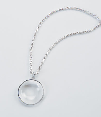 Always be prepared and look stylish while doing it with this silver pendant magnifier with chain