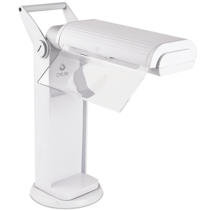A White lamp that can be carried around by the handle on top. The light part swings out and open.