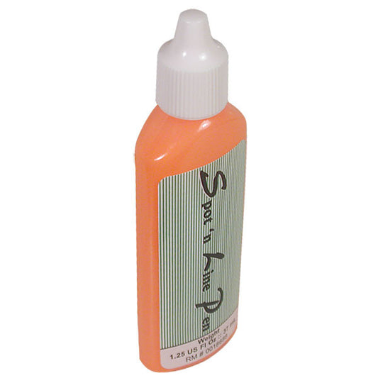 An orange tube of spot in line ink